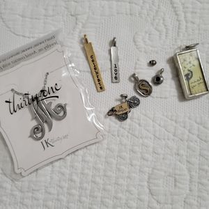 Lot of Thirty-One Charms/Jewelry